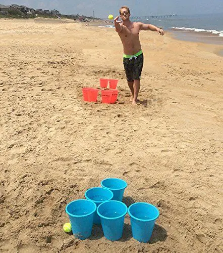 Bucket ball is a popular game for adults on the beach
